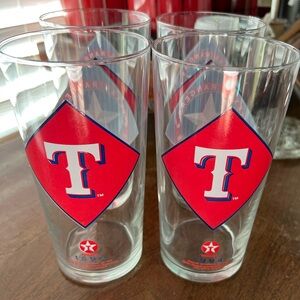 Set of 4 1994 Texaco Texas Rangers 16 oz drinking glasses. Like new! Collectible
